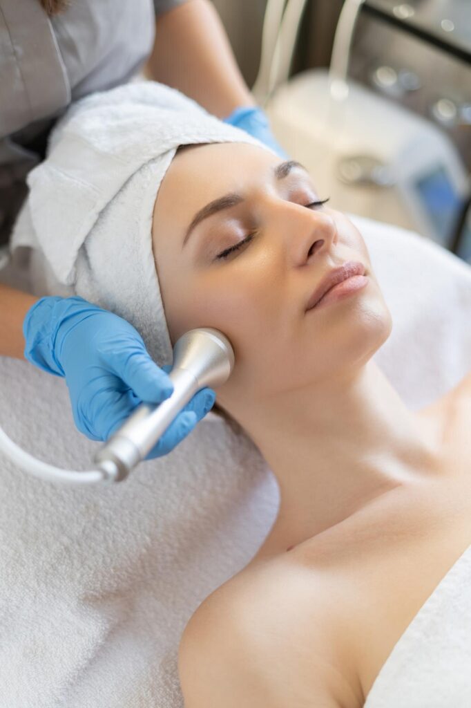 A radio frequency skin treatment being performed